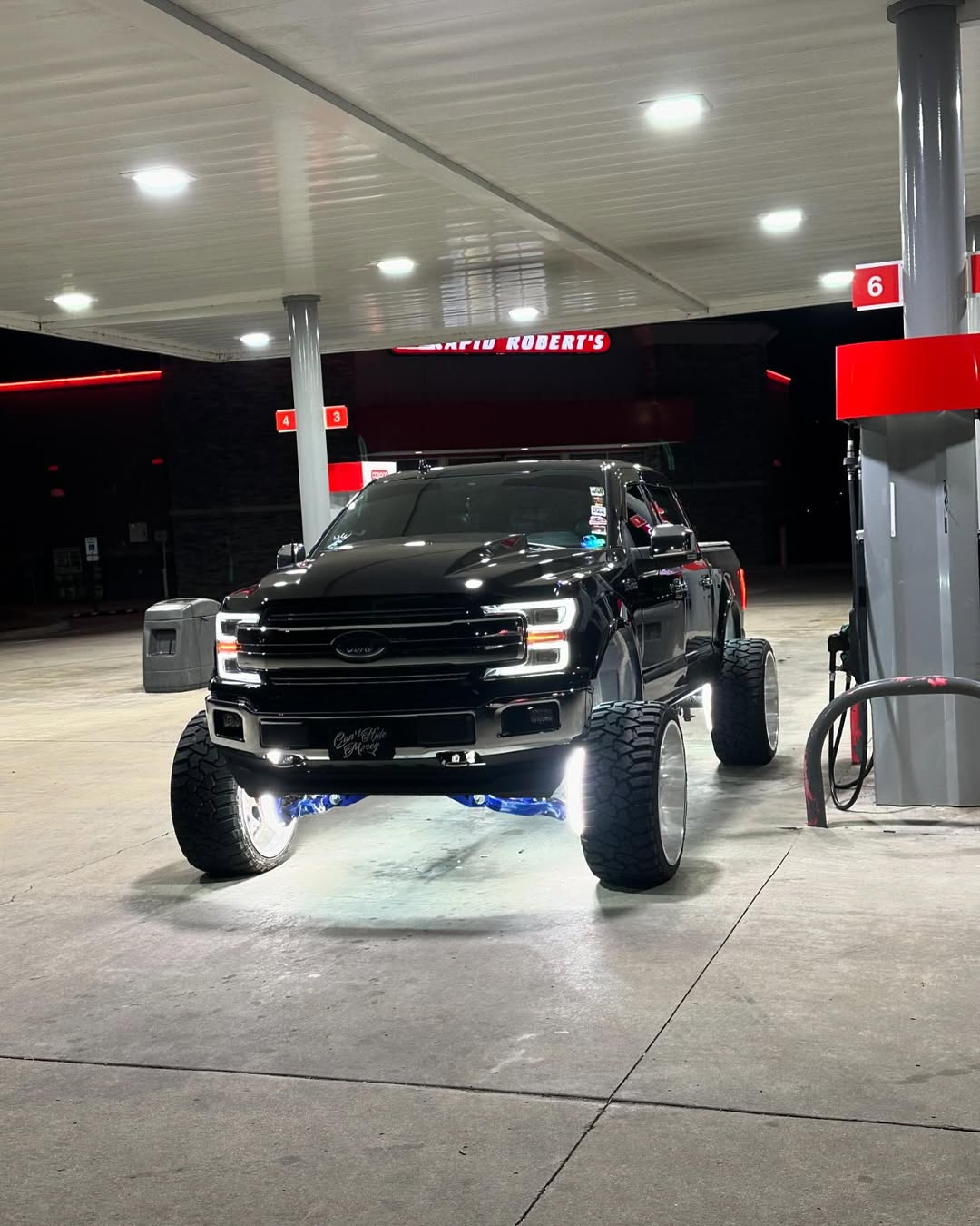 A Ford F-150 running Southern Lumen pure white rock lights.