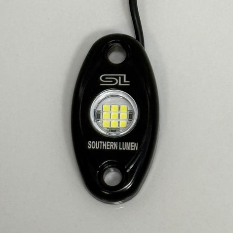 Southern Lumen 9-LED pure white rock light with a durable construction and bright illumination, ideal for enhancing vehicle aesthetics and off-road visibility.